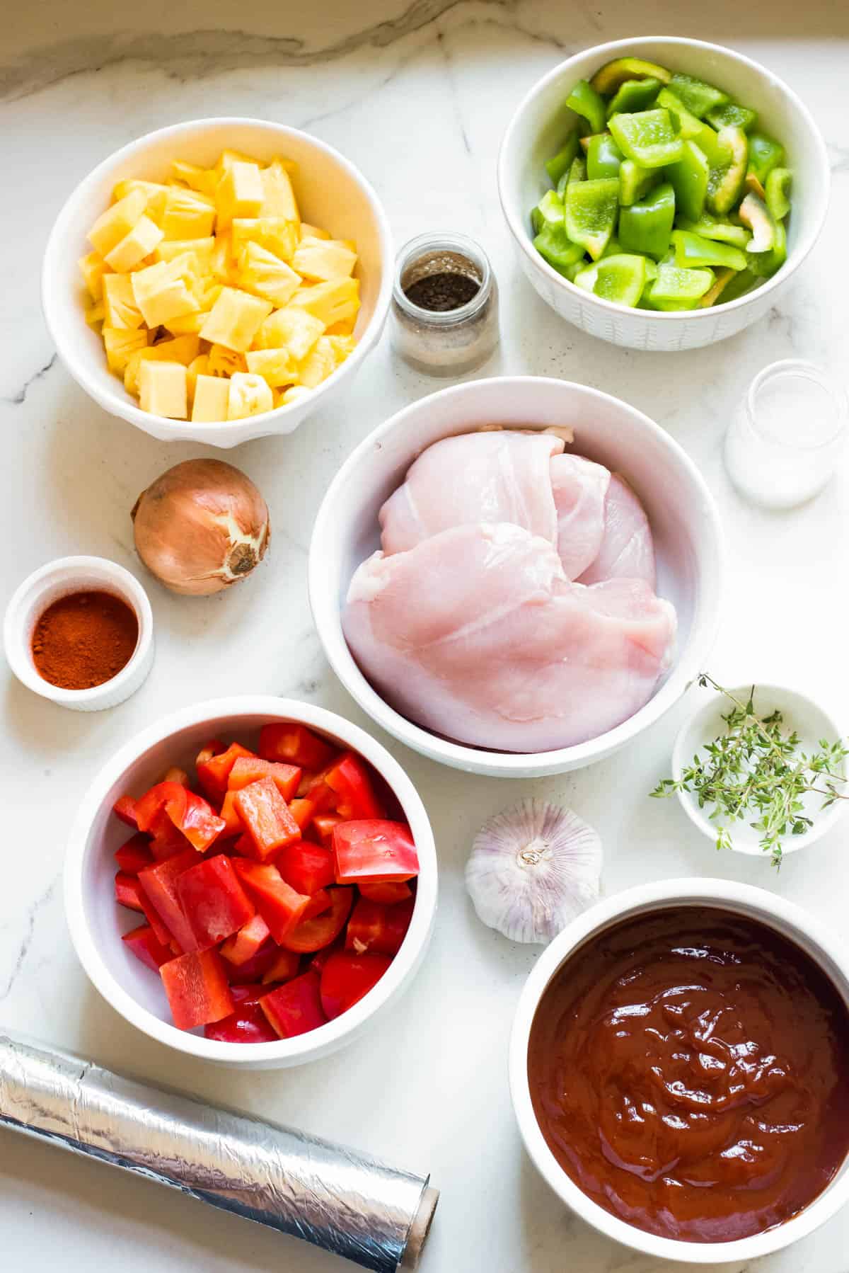 Ingredients for pineapple bbq chicken foil packets.