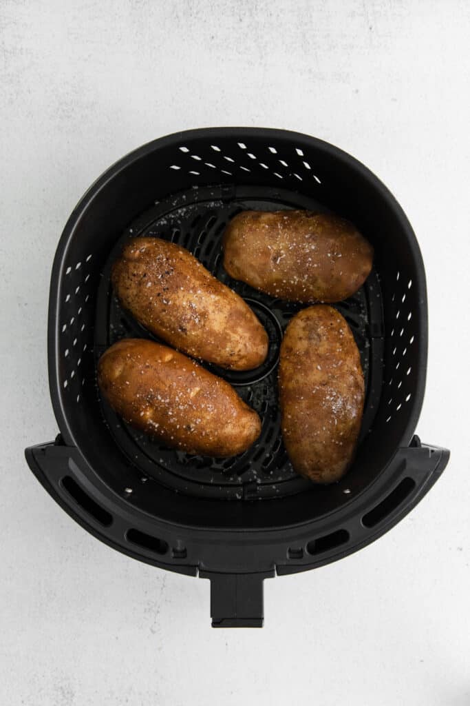 Air Fryer Baked Potatoes with Crispy Skin - easydinnerrecipes.com