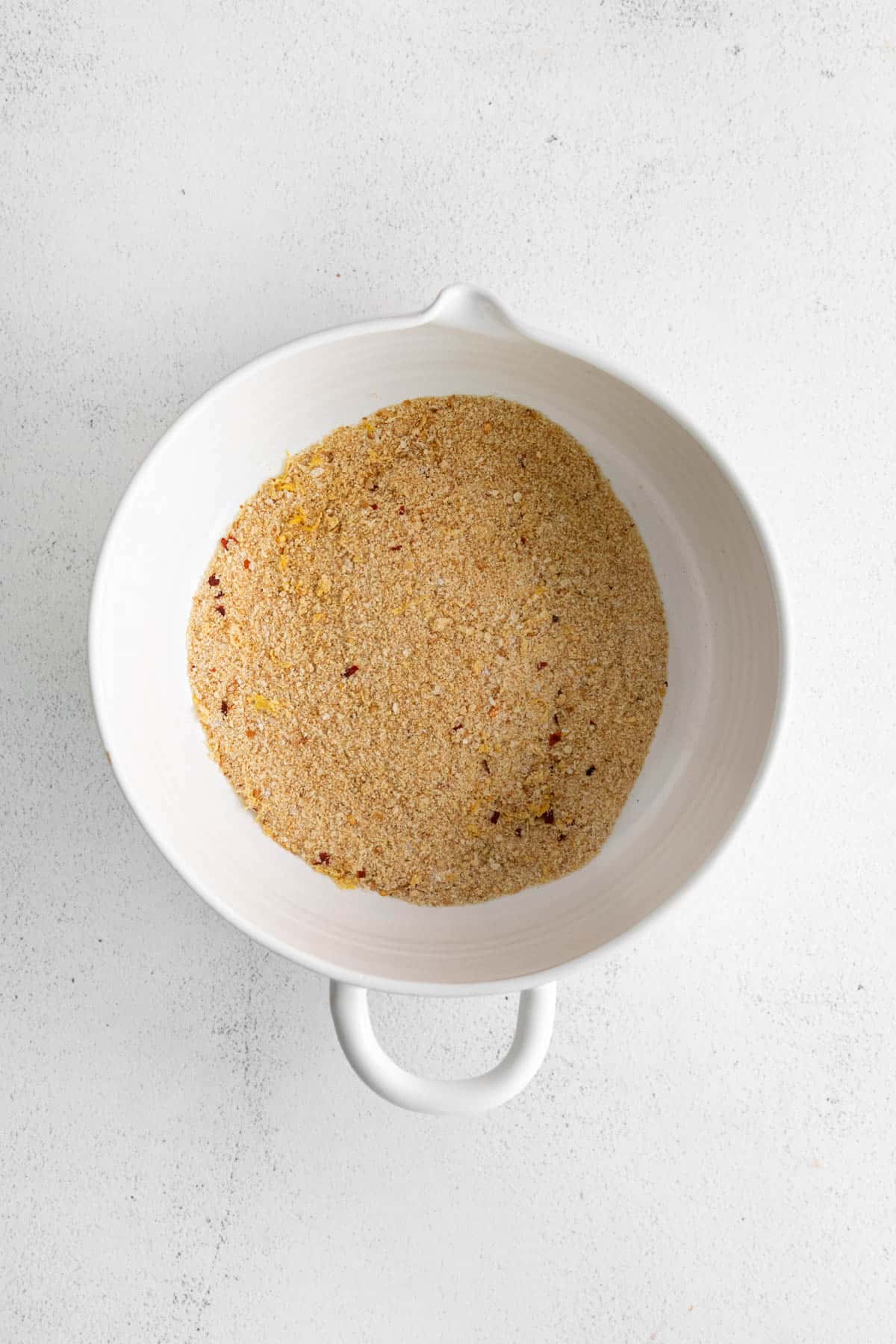 Breadcrumbs in a mixing bowl.