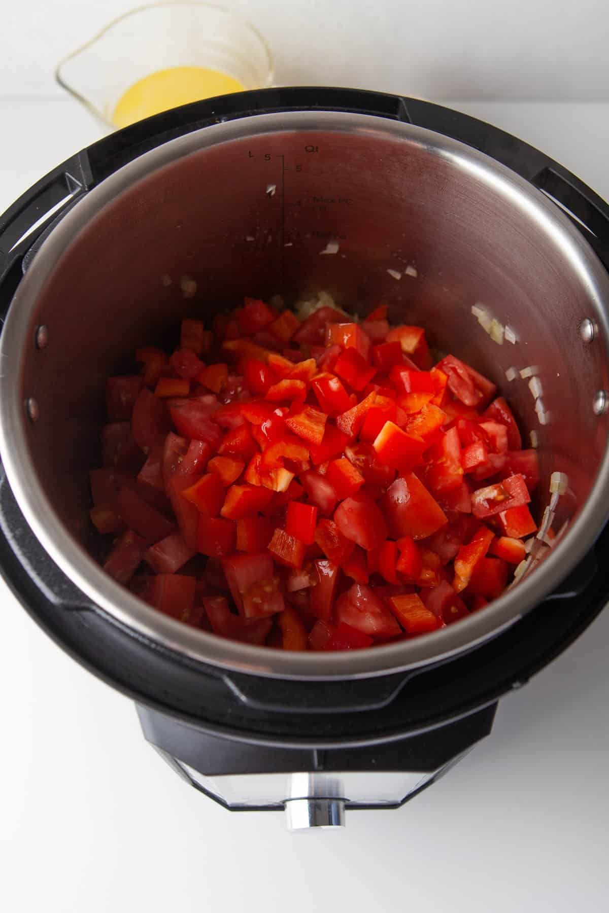 Diced tomatoes in an Instant Pot for making tomato soup.