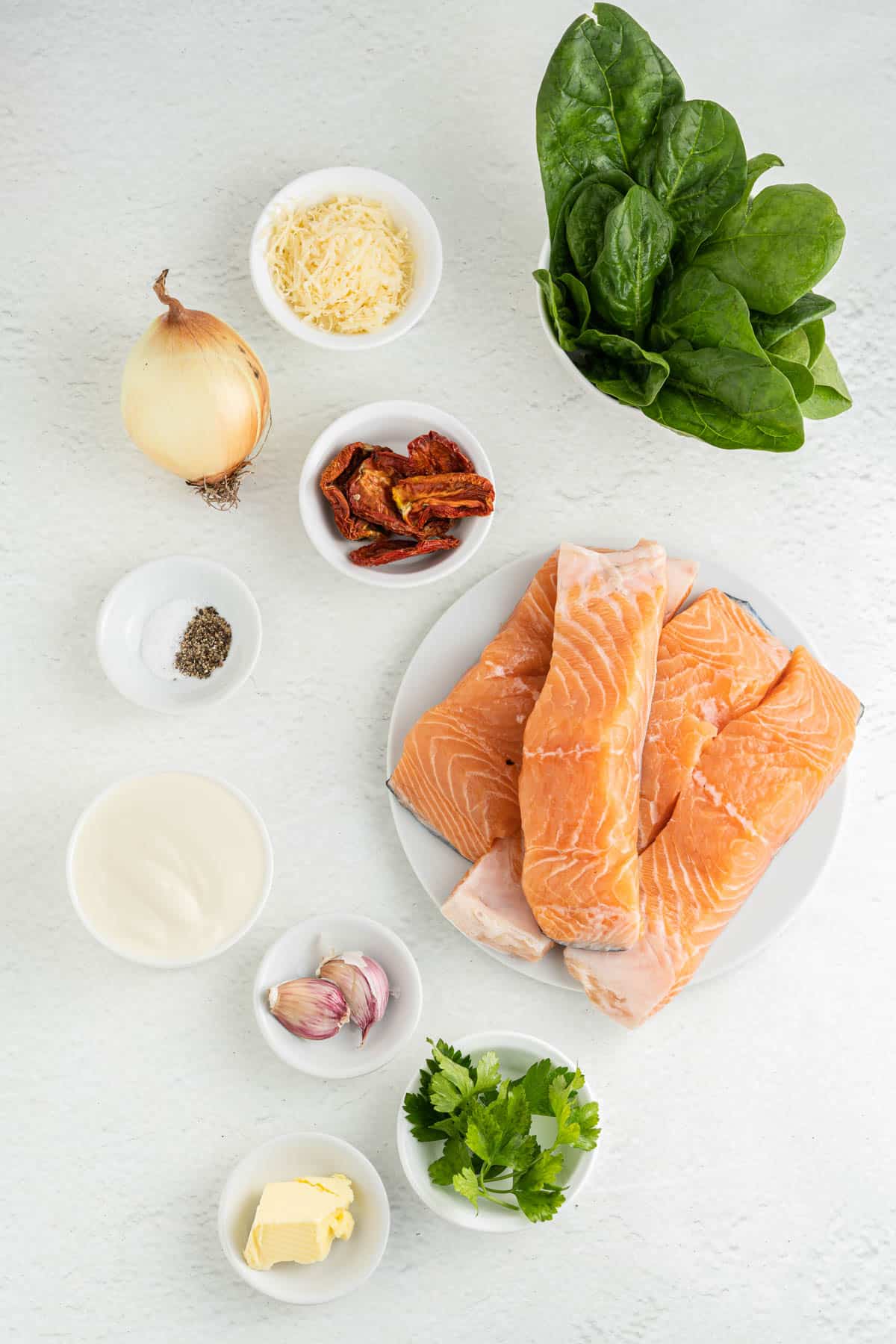 Ingredients for creamy Tuscan salmon.