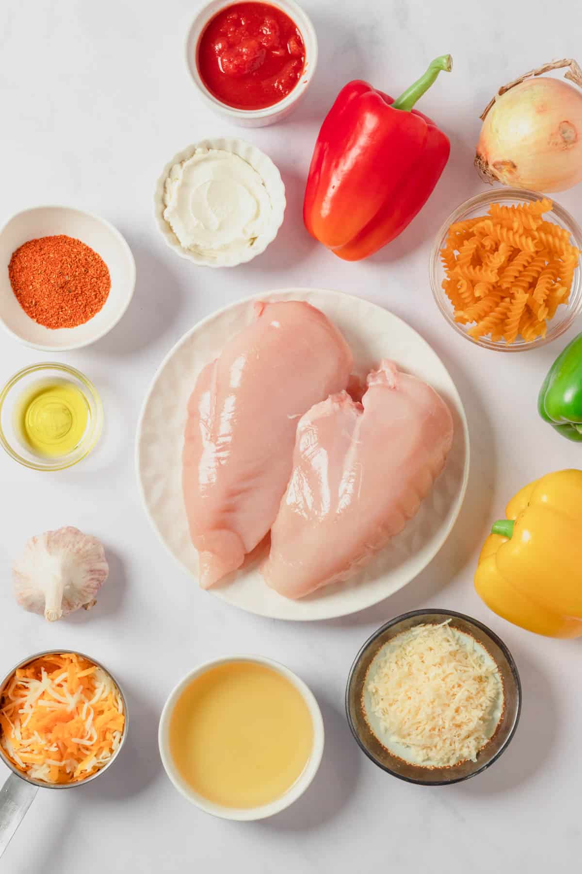 Ingredients for making chicken fajita pasta.