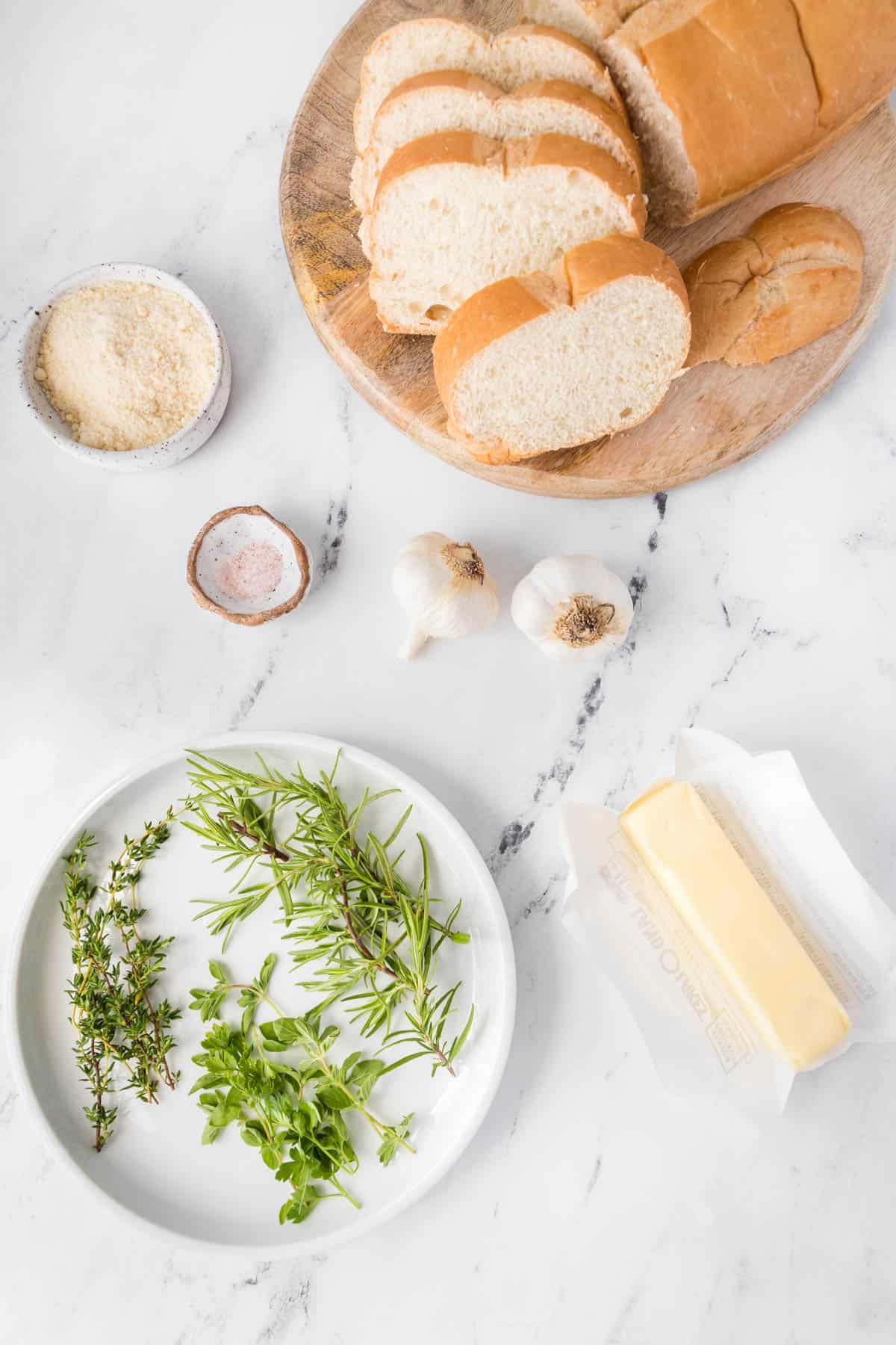 Ingredients for making homemade garlic bread.