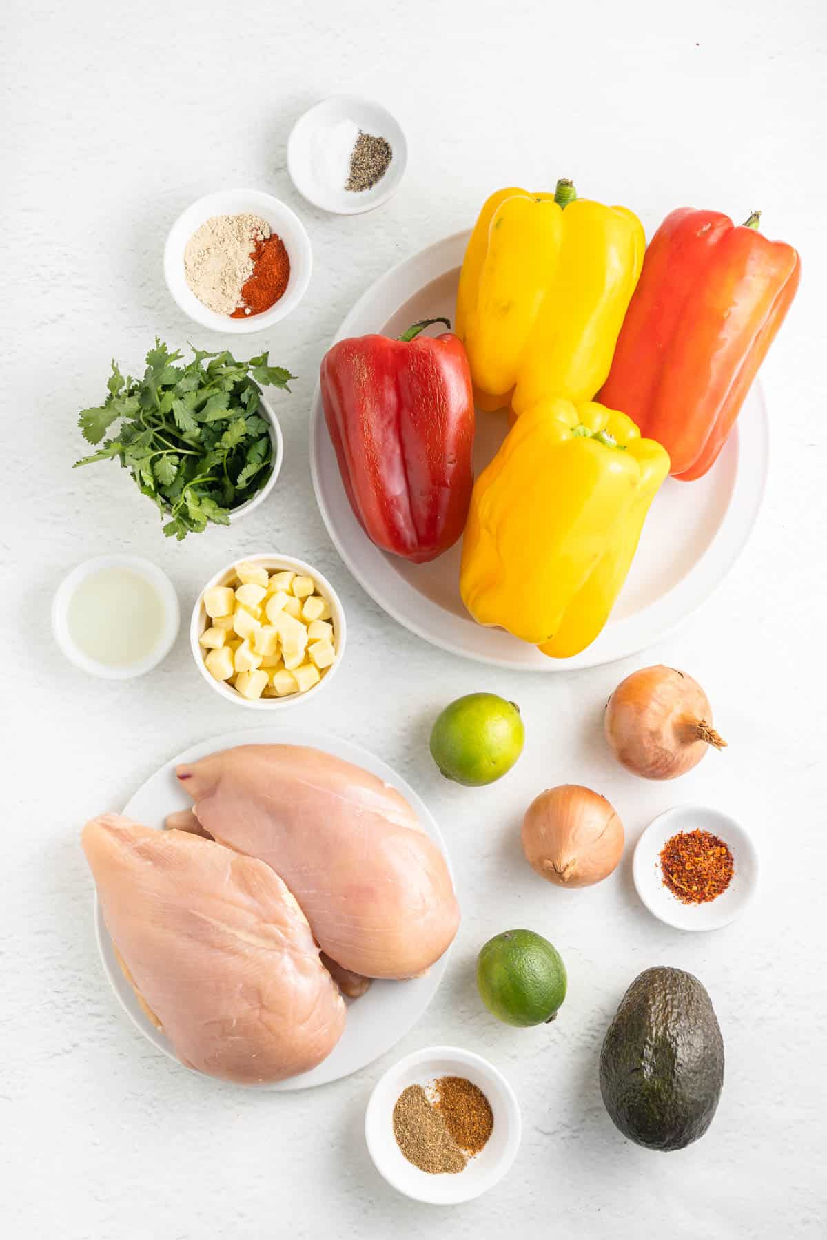 Ingredients for making fajita chicken stuffed peppers.