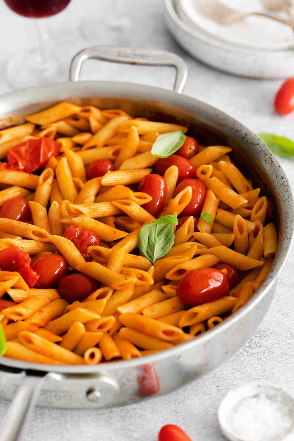 A large silver pan filled with penne all'arrabbiata.