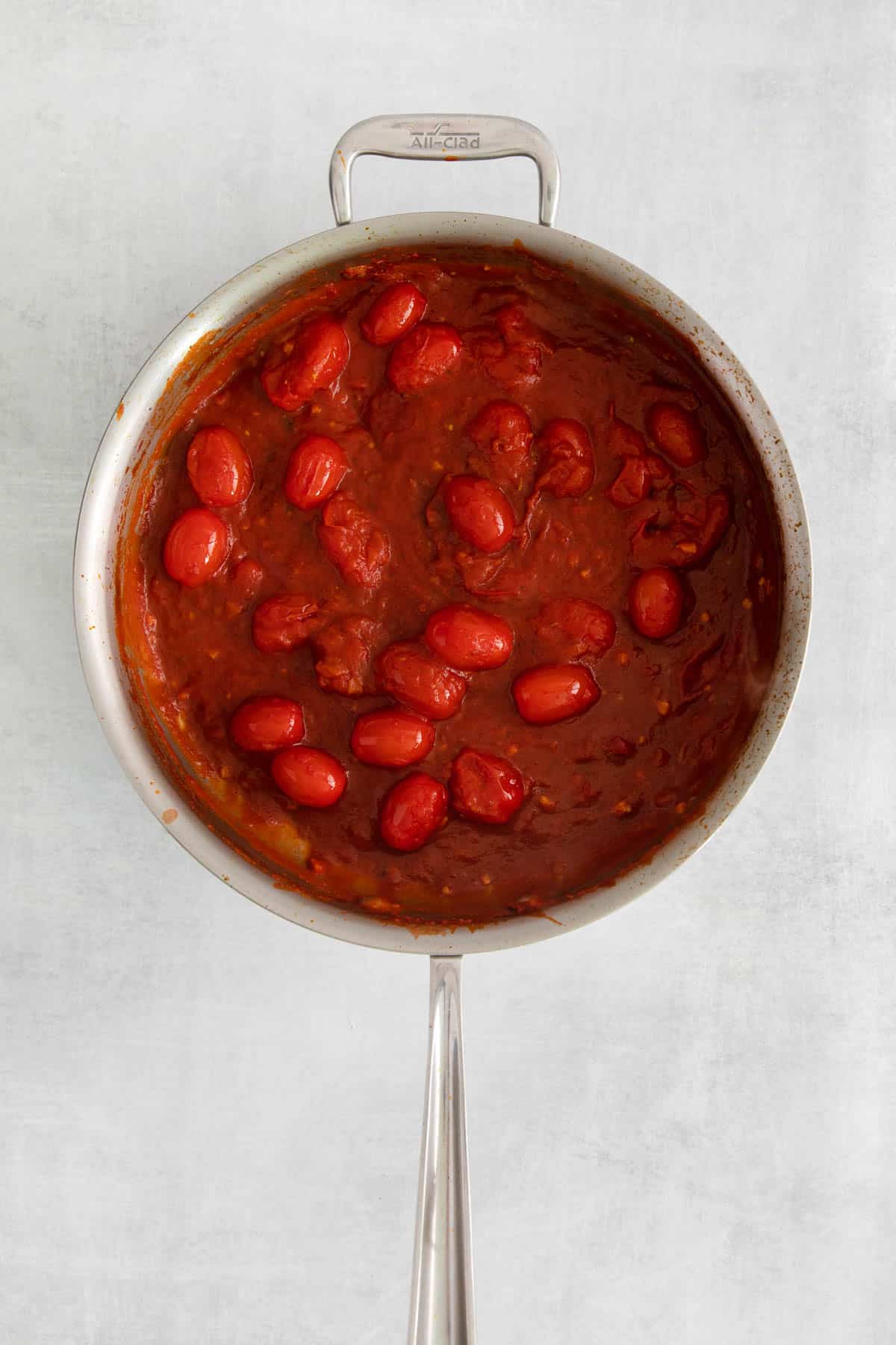 Arrabbiata sauce in a large pan.