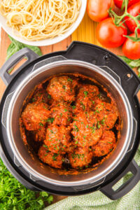 An overhead image of meatballs in an instant pot.